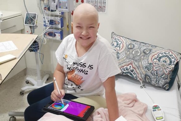 Darcy Kirk, 11, at the Royal Children’s Hospital during her third round of chemotherapy. Her mum Karly had to make her way through protesters on Saturday. 