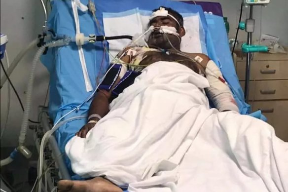 Rajeskuma Rajagopal in hospital after being attacked on Nauru in 2021.