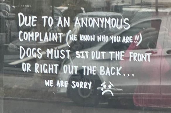 A message written on the window of the cafe, Little Genovese.