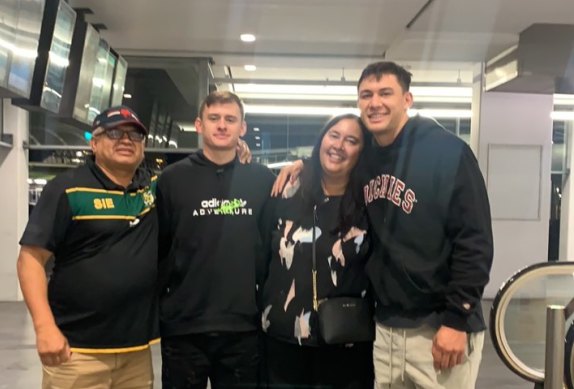 Roosters ace Joey Manu was re-united with his father Nooroa (far left) and mother Darnel for the first time in 15 months on Monday night. Also pictured is Joey’s younger brother, Kani.