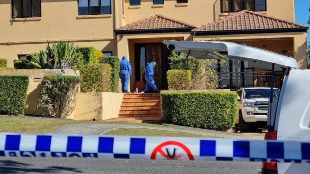 Detectives and forensic officers at the Kefu family’s Brisbane home.