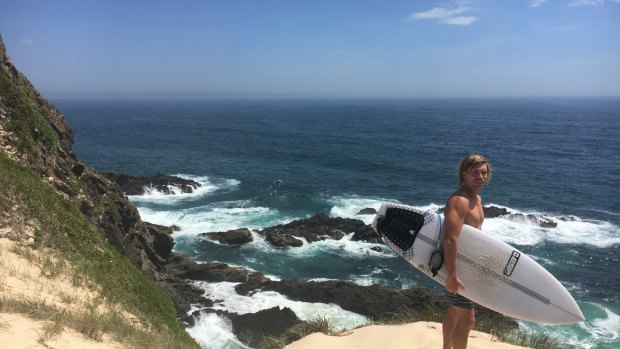 Dane Davidson was surfing with Sam Edwardes when he was attacked by a shark. 