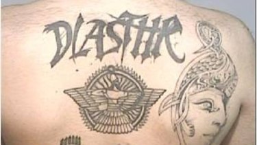 A DLASTHR gang member tattoo.