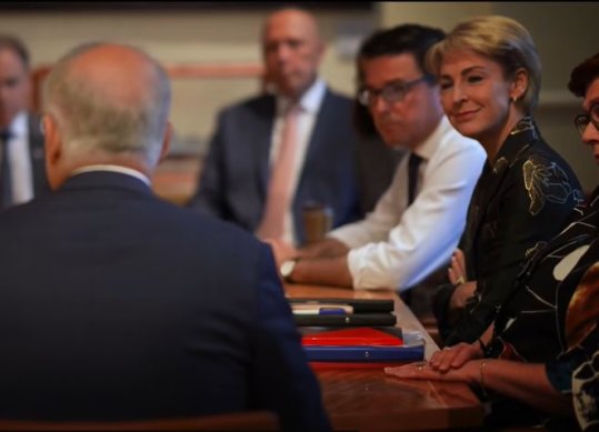 Some women smile at Morrison too, including Attorney General Michaelia Cash.