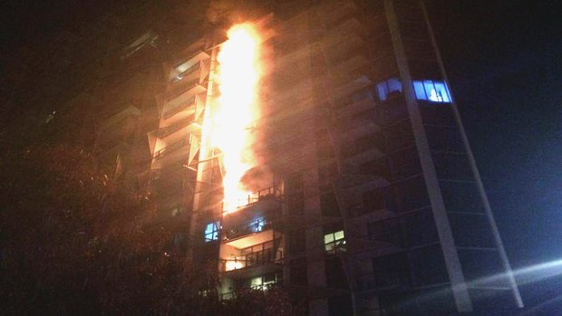 Cladding on the Lacrosse apartments in Docklands burns in the 2014 fire. 