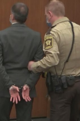 In this image from video, former Minneapolis police Officer Derek Chauvin is taken into custody.