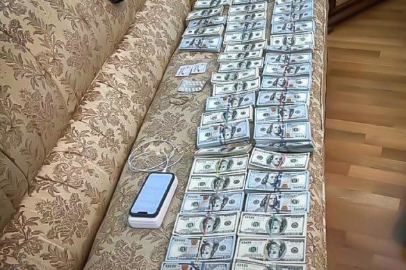 The National Anti-Corruption Bureau of Ukraine (NABU) posted this picture of cash it said was connected to “undue benefits” and the country’s Supreme Court.
