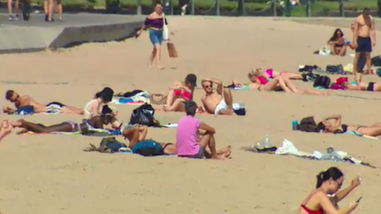 Dozens of people have been spotted at Melbourne's St Kilda beach today, despite social distancing rules.