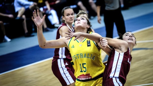 Sapphires' Isobel Anstey wrestles for position against Latvia in a group match at the under-17 FIBA Women's World Cup.