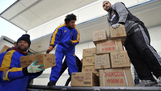 Helping hand: Scott Fardy and teammates in the aftermath of the March 2011 tsunami. 