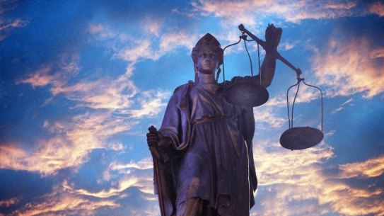 A man has been charged with manslaughter more than a year after a fatal fight in Docklands.