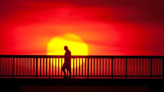 The IEA says Australia should consider a national energy plan to boost climate resilience.