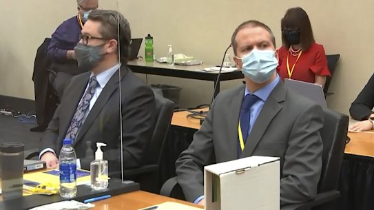 Defence attorney Eric Nelson, left, and former Minneapolis police officer Derek Chauvin on the first day of the trial.