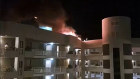 The pilot of a helicopter that crashed into a waterfront hotel in Cairns was killed and two people were injured in the crash, Nine News has reported. Users on social media posted videos of a fire on the hotel’s roof.