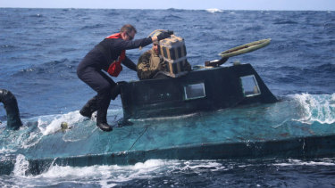 US Coast Guard members board a self-propelled semi-submersible in international waters in 2019. A new “narco sub” has been intercepted on its way to Puerto Rico.