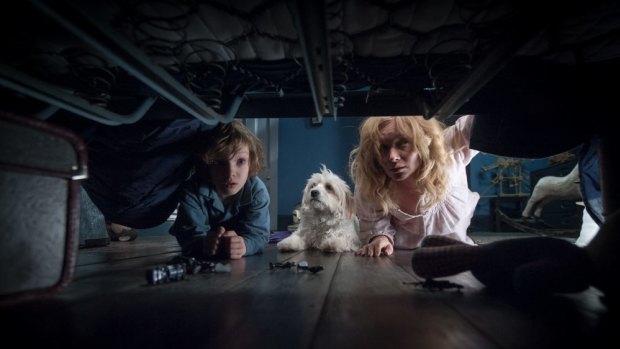Essie Davis battles with her son's fear of a monster lurking in the house in The Babadook.