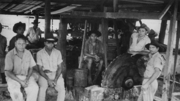 Hans Pearson (far right) in 1965 with fellow workers at the Hope Vale saw mill in far north Queensland. 
