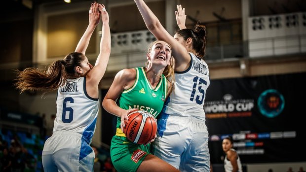 Splitting the gap: Opals forward Alanna Smith drives to the basket against Argentina.