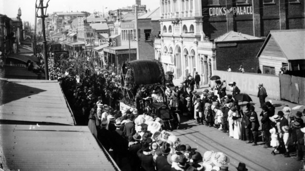 A procession passes Cook's Picture Palace in Brunswick Street, Fortitude Valley in 1911.