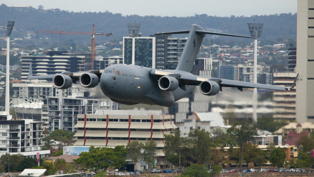 The C-17A Globemaster flys over Woolloongabba on Thursday afternoon in preparation for Riverfire.