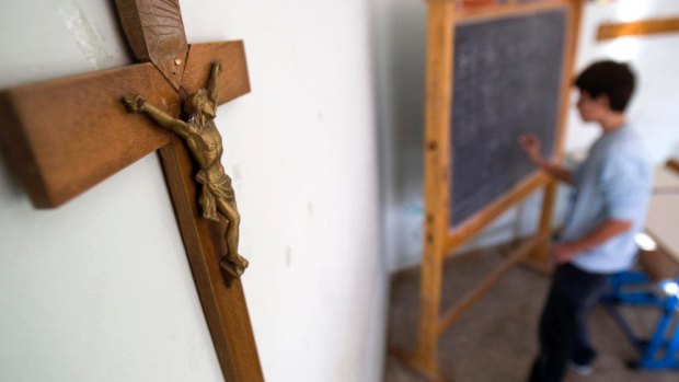 Queensland will rein in some religious instruction material in state schools.