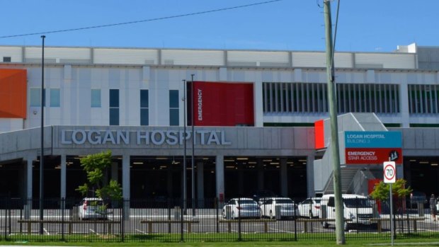 Staff were left shaken after a student nurse was allegedly car-jacked at gunpoint out the front of the hospital. 