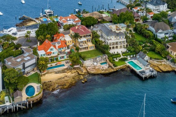 The Point Piper waterfront homes owned (left to right) by Bruce Solomon, Bruce McWilliam, the Cranes and the billionaire Huang family in Altona.