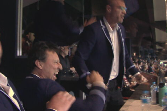 Laurie Daley pumps his fist in the coaches’ box after Cameron Murray scored NSW’s third try.