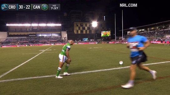 Sharks trainer Daniel Holdsworth runs past Jamal Fogarty as he attempts a conversion on Sunday night.