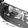 A truck driver using his mobile phone with both feet on the dashboard.