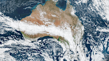 A massive cloudband extends across Australia, bringing steady rain to the inland.