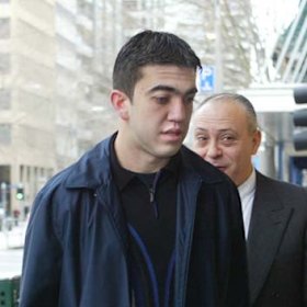 Faruk Orman (centre) outside Melbourne Magistrates Court in 2004.