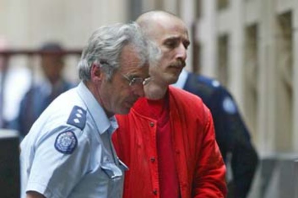 Hoddle Street mass murderer Julian Knight enters court in 2003.