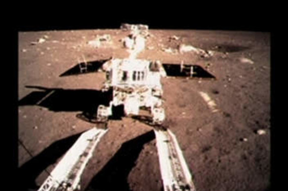 China's first moon rover, Yutu, or Jade Rabbit, moves onto the lunar surface.