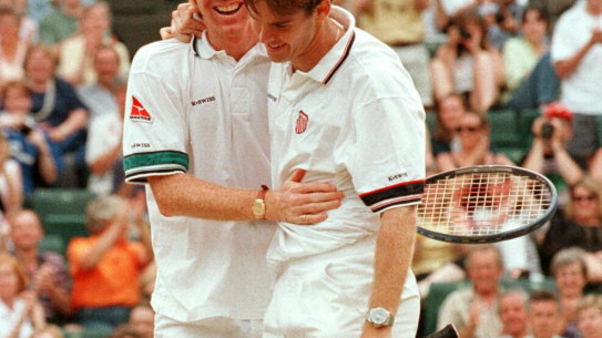 The Australian doubles team of Mark Woodforde and Todd Woodbridge celebrate after beating Paul Haarhuis and Jacco Eltingh of the Netherlands.