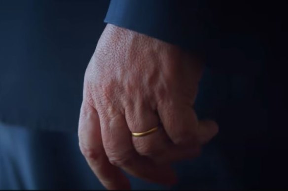 The camera lingers on Morrison’s wedding ring, for he is married, and Albanese is not.