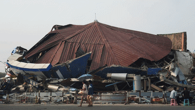 Rescuers tread lightly to find survivors they know are still breathing