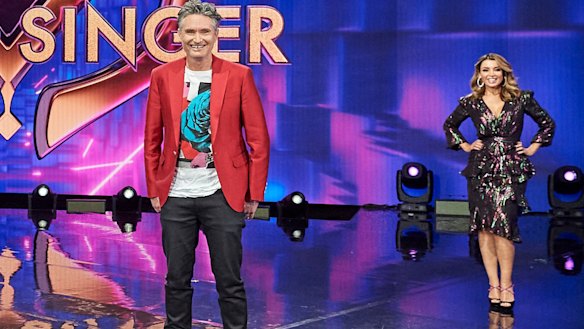 A socially distant Dannii Minogue (right) on The Masked Singer set following her stay in quarantine.