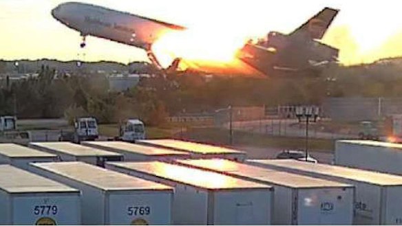 The fire in the area of the left pylon attachment to the wing continued as the plane cleared the blast fence.