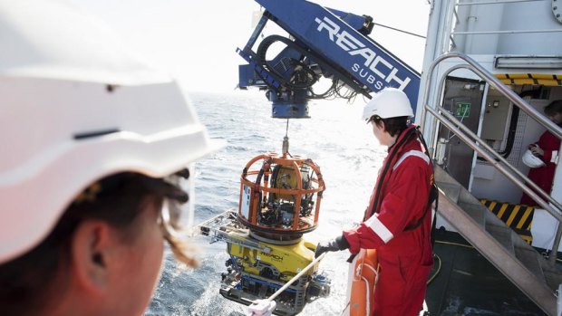 Scientists launch the ROV from the Stril Explorer.