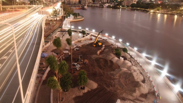 New public space pushes out over the Brisbane River, 40 metres beyond the Riverside Expressway, as part of the Queens Wharf development.