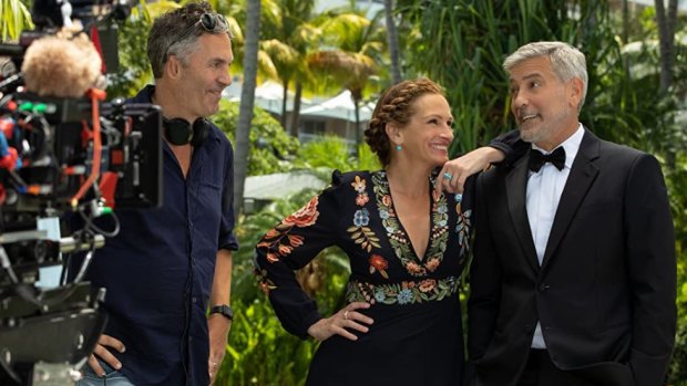 Director Ol Parker with Julia Roberts and George Clooney on the set of Ticket to Paradise.