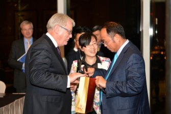 Huang with then Trade Minister Andrew Robb in Hong Kong in 2014, the year the China free trade agreement was signed.