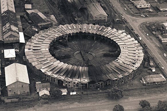 A historical image of the Rockhampton railyard, including the roundhouse.