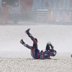 Jack Miller tumbles through the gravel at the MotoGP.