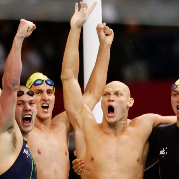 Ashley Callus, Chris Fydler, Michael Klim and Ian Thorpe celebrate their gold in the 4x100m relay. The Australians set a world record of 3:13.67 while Klim also broke the individual world record, finishing his leg in 48.18s. 
