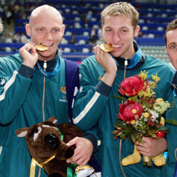 Todd Pearson, Michael Klim, Ian Thorpe and William Kirby celebrated gold for Australia after the 4x200m freestyle relay ... with Fatso.
