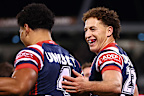 Mark Nawaqanitawase of the Roosters celebrates scoring a try.