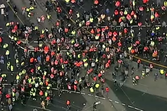Thousands of protesters heading to Victoria’s state Parliament earlier today.