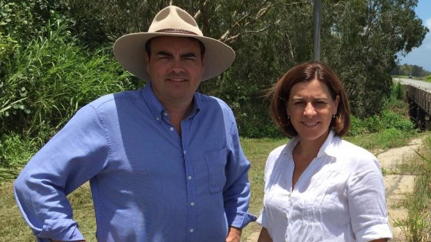 Newly independent MP Jason Costigan, pictured with LNP leader Deb Frecklington, will miss the first sitting week.